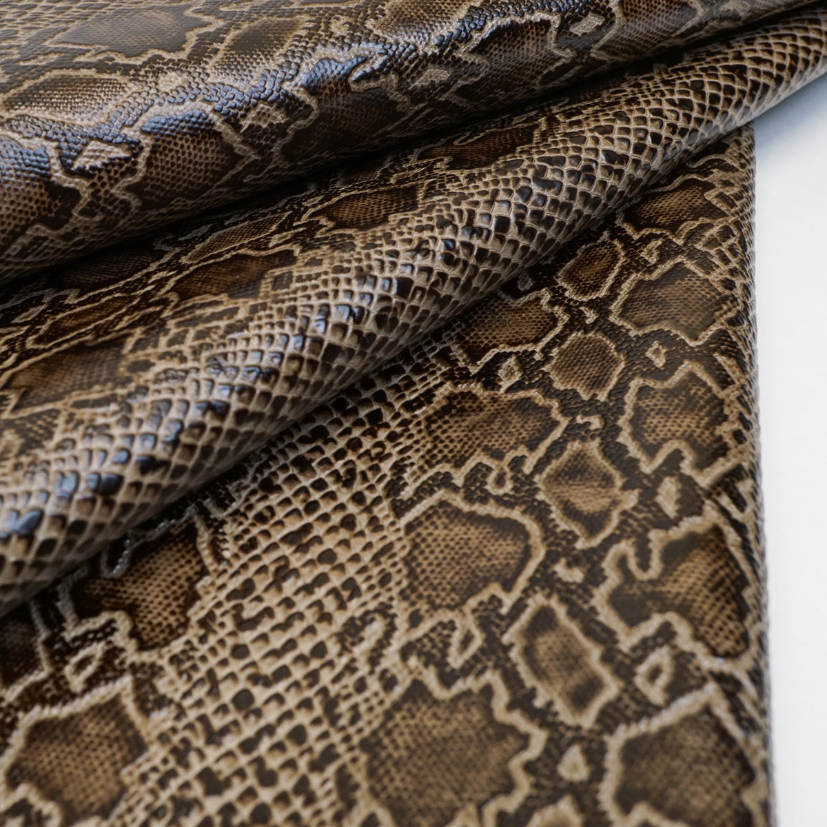 665-30521.SLC.3.jpg Pre-Cut Embossed Python Smokey Quartz - 12"x12". Image