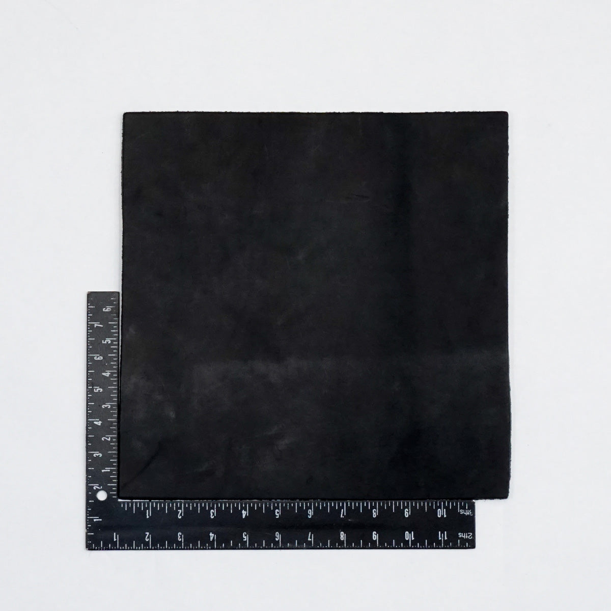 49-9120.SLC.2.jpg Hermann Oak Drum Dyed Black Pre-Cut 6-7 oz. 12" x 12" Image
