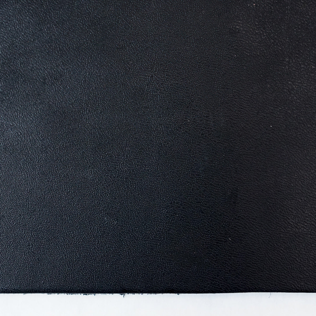 49-9022.SLC.4.jpg Hermann Oak Drum Dyed Black Pre-Cut 6-7 oz. 12" x 24" Image