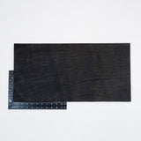 49-9122.SLC.2.jpg Hermann Oak Drum Dyed Black Pre-Cut 8-10 oz. 12" x 24" Image
