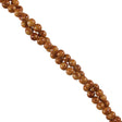 274-10.SLC.jpg 4mm Round Fossil Strand - Brown Image