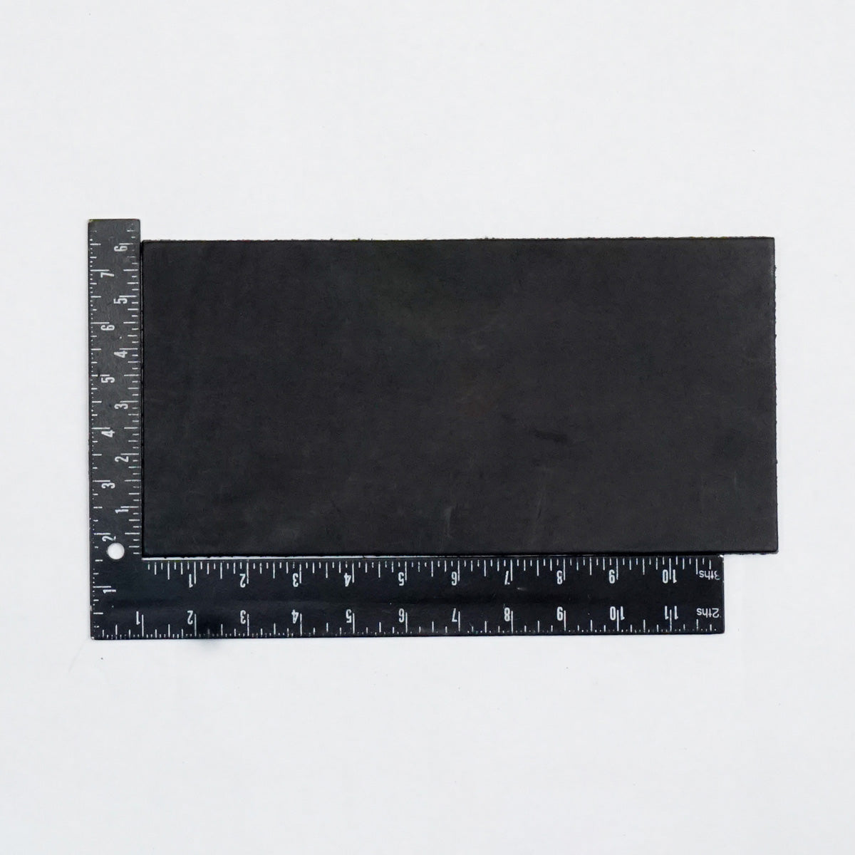 49-9200.SLC.2.jpg Hermann Oak Drum Dyed Black Pre-Cut 8-10 oz. 6" x 12" Image