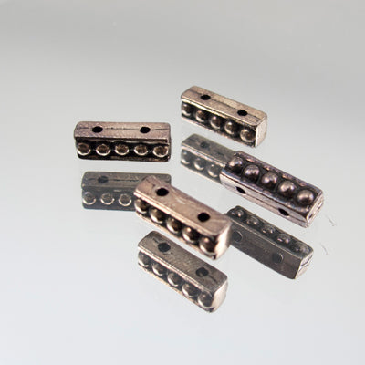 244-555012.SLC.jpg 10mm 2 Hole Dots Spacer - Silver Plate Image