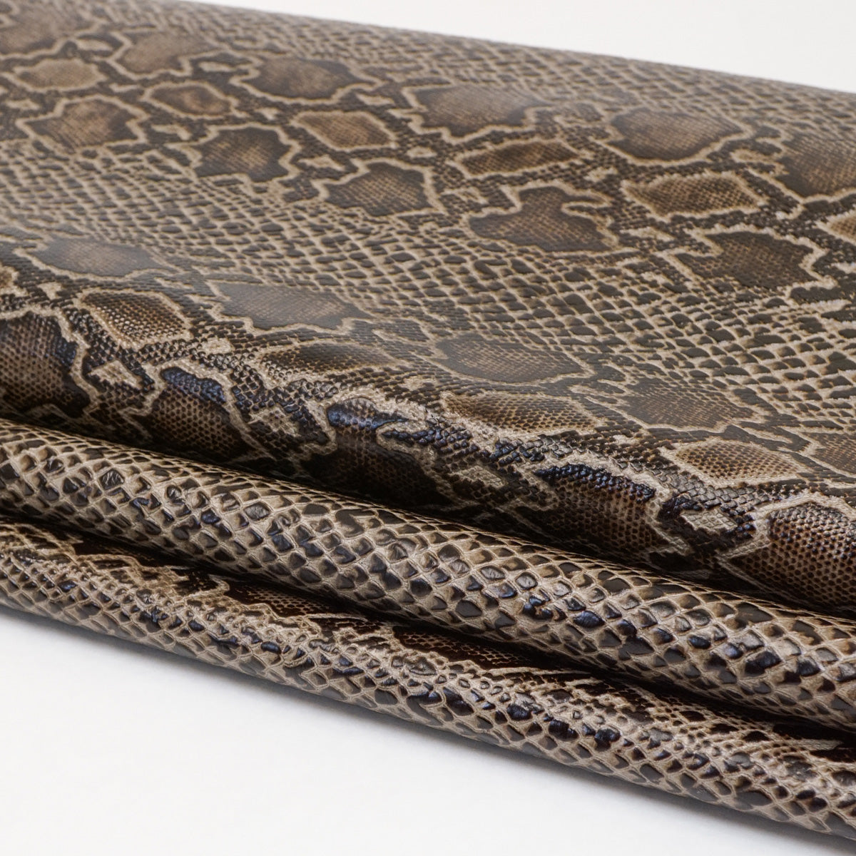 665-30521.SLC.4.jpg Pre-Cut Embossed Python Smokey Quartz - 12"x12". Image